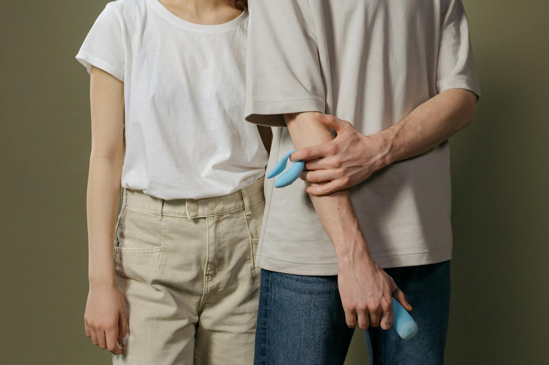 A couple sitting together, symbolizing intimacy and connection despite distance.